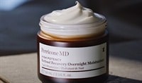 A jar of Perricone MD face cream with the lid off and the cream exposed.