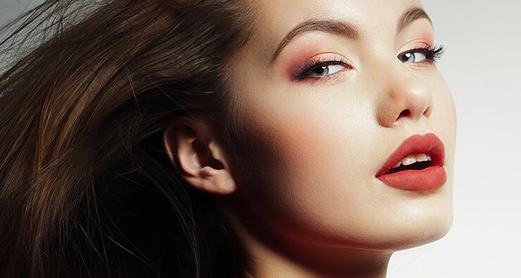 picture of a woman with matte rose-colored lips