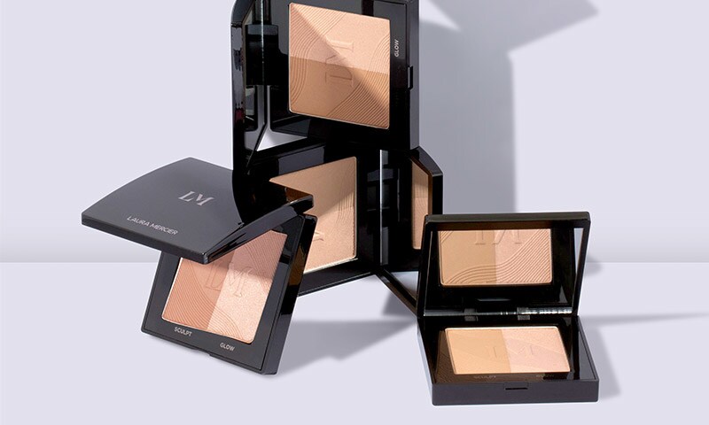 Bronzer pans open and stacked on top of each other artfully