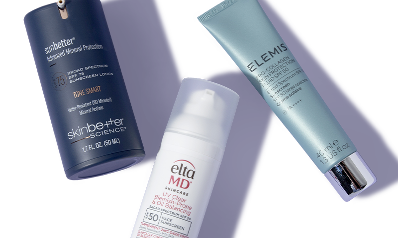 Three sunscreens lying next to each other