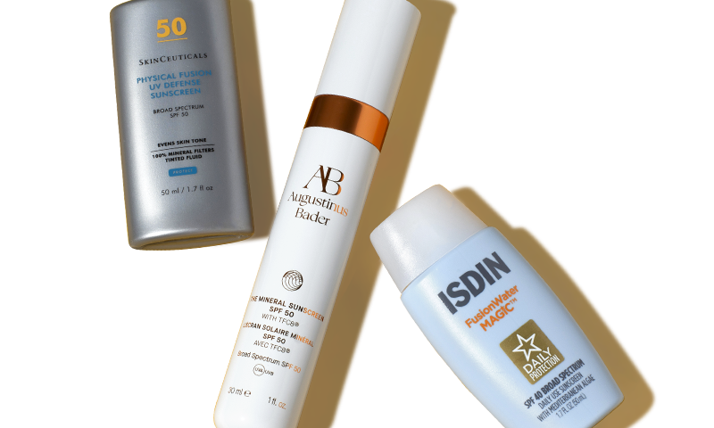 Three sunscreens lying next to each other