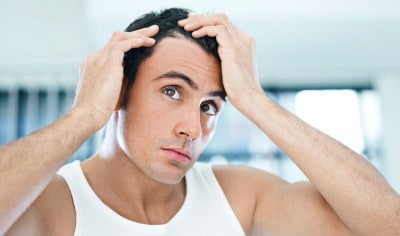 Does Wearing a Hat Make You Bald? The Biggest Hair Loss Myths Debunked