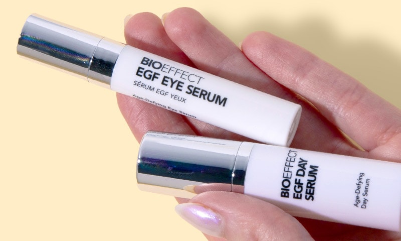 Hands holding BIOEFFECT EGF Eye and Day Serum