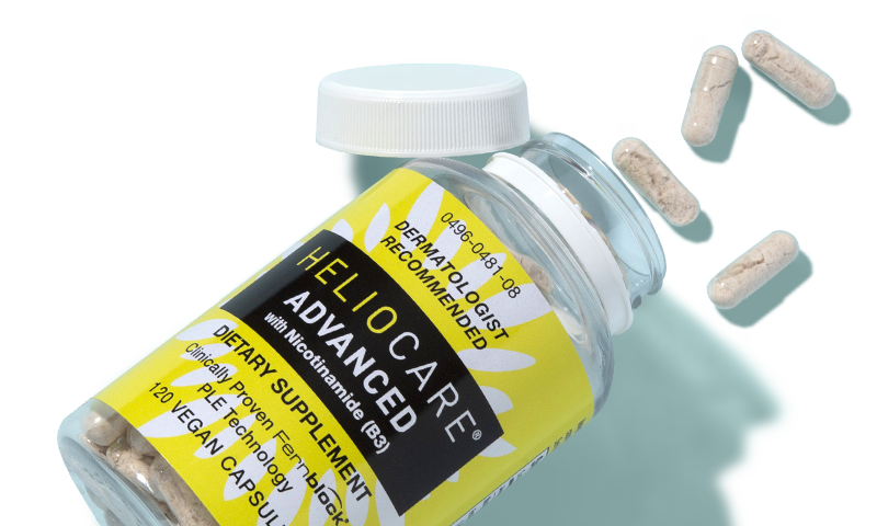 Open bottle of HELIOCARE Advanced Antioxidant Supplement with Nicotinamide