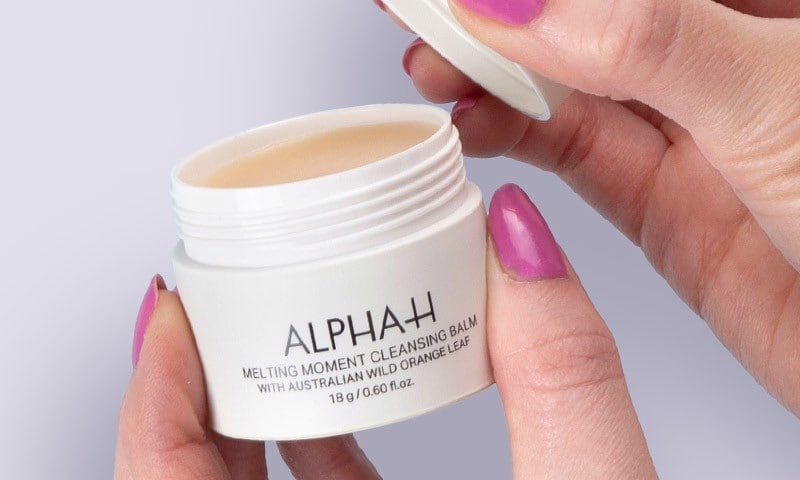 Free $14 Travel-Size Melting Moment Cleansing Balm with  $50 Alpha-H purchase
