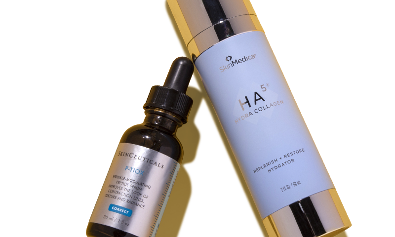 A bottle of SkinCeuticals P-TIOX lying next to SkinMedica HA5 Rejuvenating Hydrator.