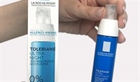 One hand holding a container of La Roche-Posay Toleriane Dermallergo Night while holding the carton in the other