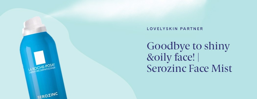 A blue bottle of La Roche-Posay Serozinc Zinc Sulfate Solution spraying.