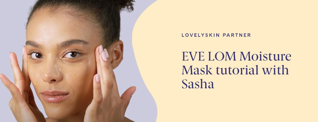 Young woman applying skin care to her face