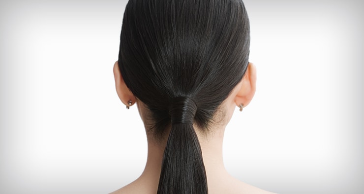 Dress up a basic pony by keeping it sleek and just at the nape of the neck.