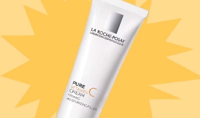 White La Roche-Posay Vitamin C cream tube against a yellow background