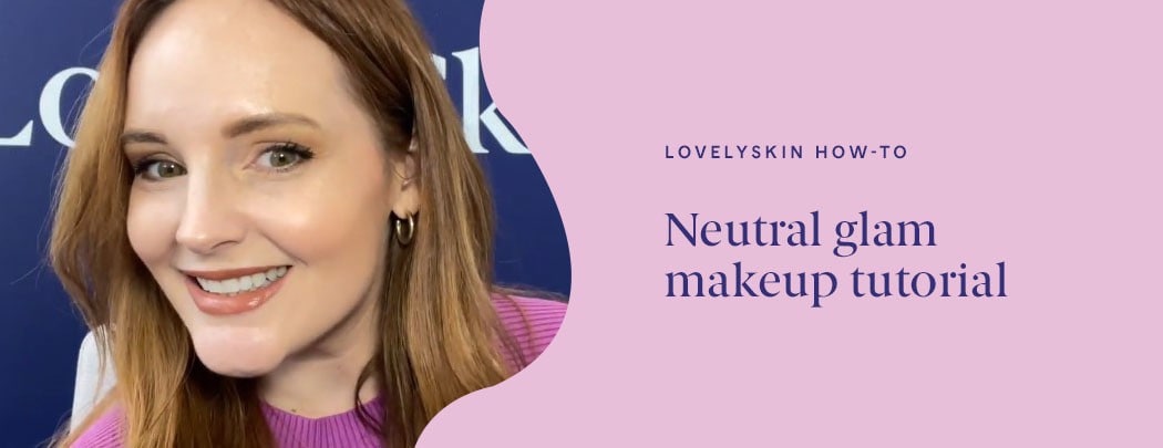 A woman with fair skin and reddish brown hair smiles at the camera wearing a neutral-toned makeup look.