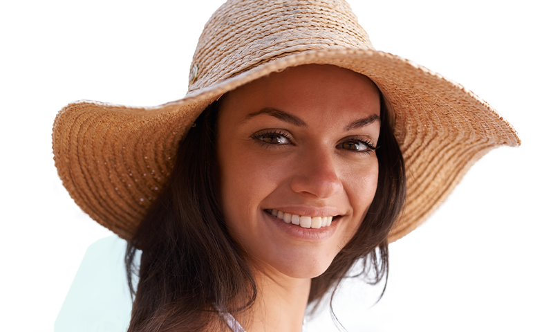 Woman smiling in a straw hat