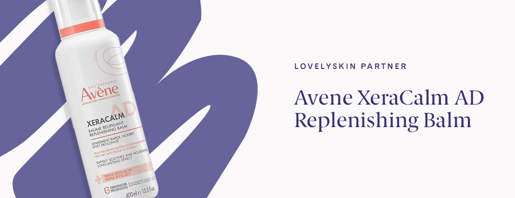 A bottle of Avene XeraCalm AD Replenishing Balm lays over an illustrative purple squiggle.