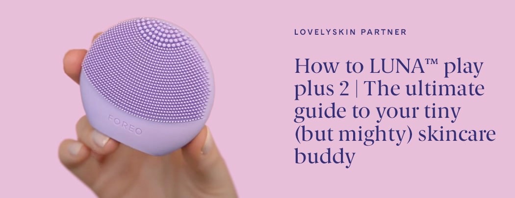 Hand holding a FOREO LUNA Play Plus 2 device