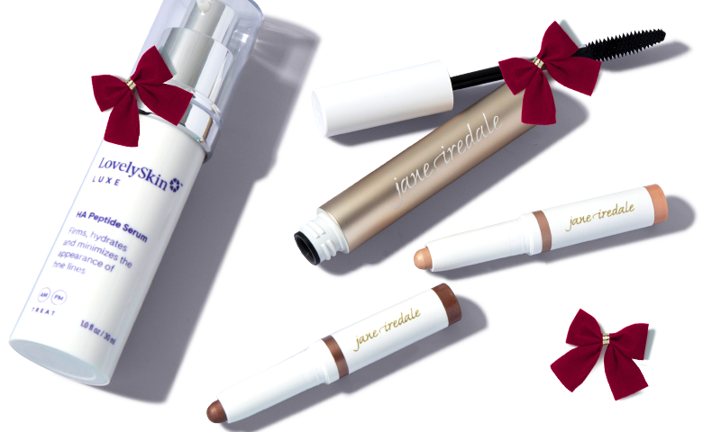 A collection of beauty products surrounded by gold ribbon