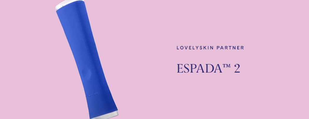 A cobalt blue skin care device with a clear touchpoint on top and an on button with FOREO stamped into it