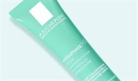 A green tube of La Roche Posay Hydraphase Eye Cream on a white background