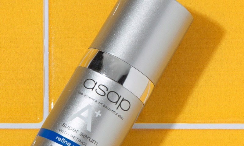 asap Super A+ Serum on a bright yellow tiled background