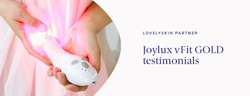 A person holds the Joylux vFit product in their hands. The red LED lights are illuminated.