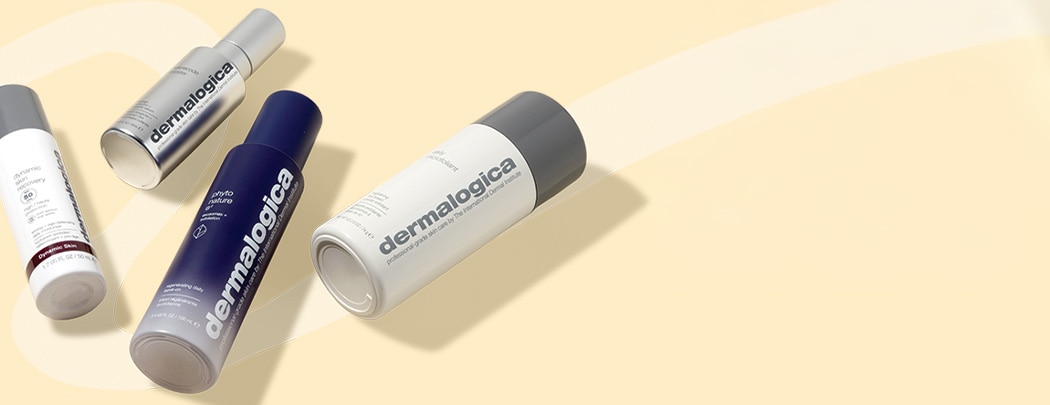 A smattering of Dermalogica products lay over a yellow background.