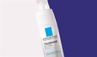 A bottle of La Roche-Posay Toleriane Ultra Eye Cream against a purple backdrop
