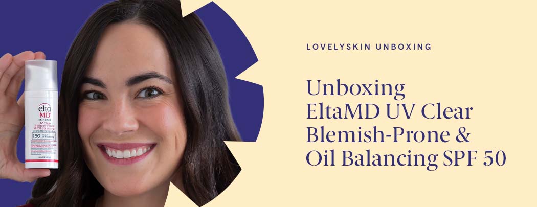 A woman with medium skin tone and dark hair holds a white bottle of EltaMD UV Clear Blemish-Prone & Oil Balancing SPF 50 near her face while smiling.