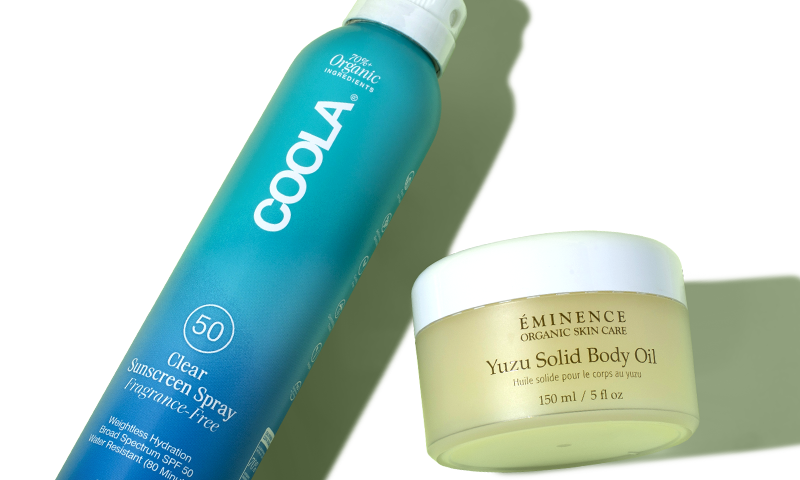 COOLA and Eminence Organics products lying next to each other