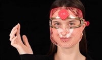 A woman wearing the FOREO FAQ 201 LED Mask