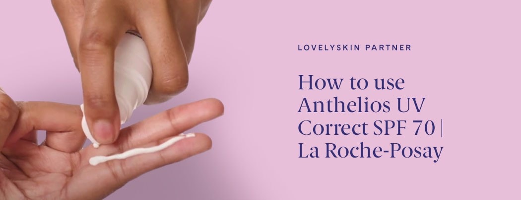 Woman applies Anthelios UV Correct SPF to her finger