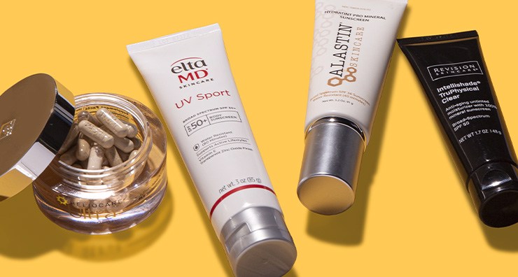 Sunscreens from EltaMD, ALASTIN Skincare and Revision Skincare with Heliocare supplements on an orange background