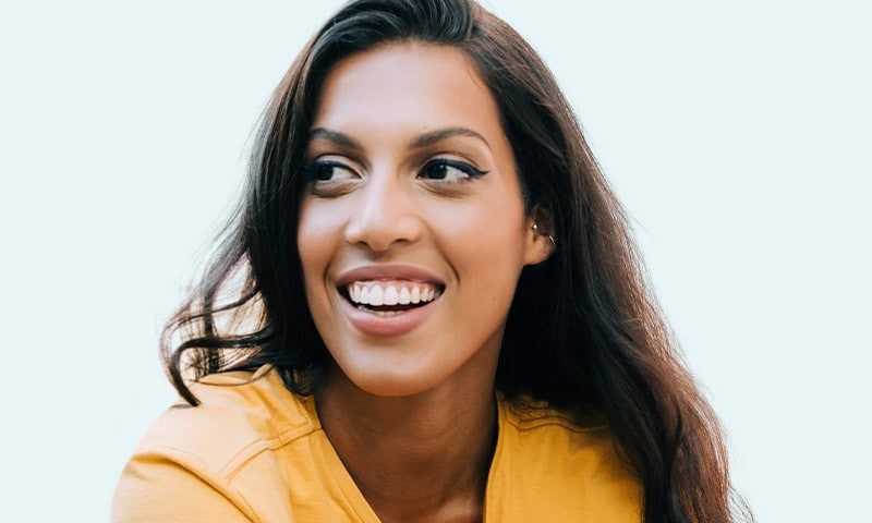 Woman smiling and looking off camera