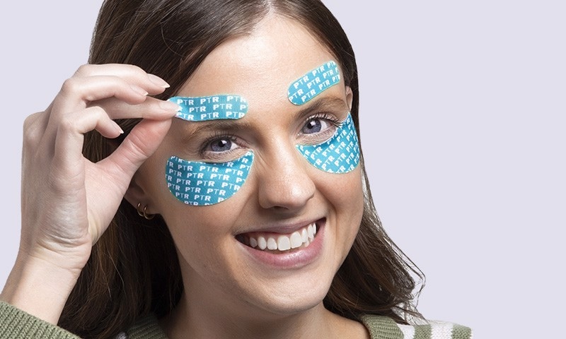 model with PTR face tape