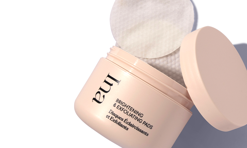 A pink electric trimmer and post-hair removal serum.