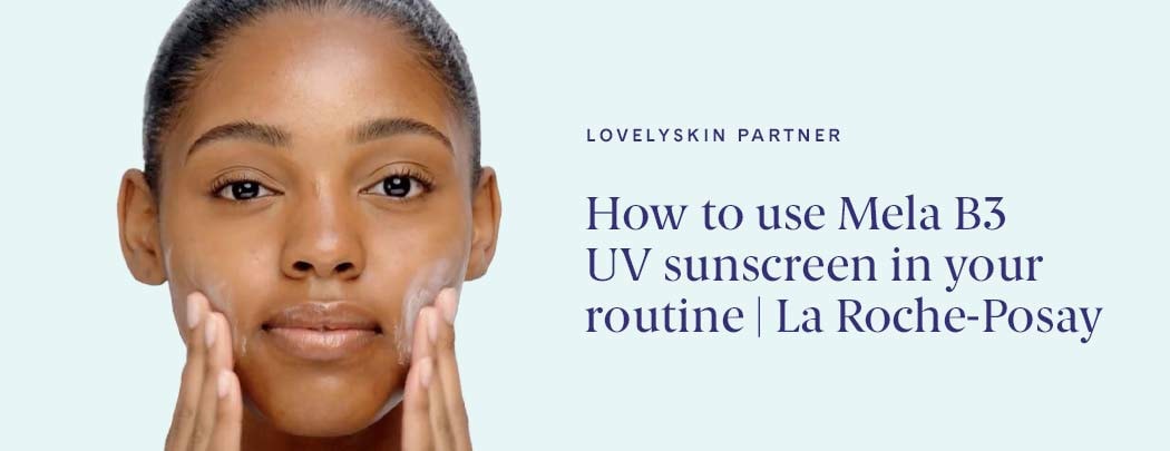 mixed race woman applies La Roche-Posay MELA B3 UV sunscreen to face with hands