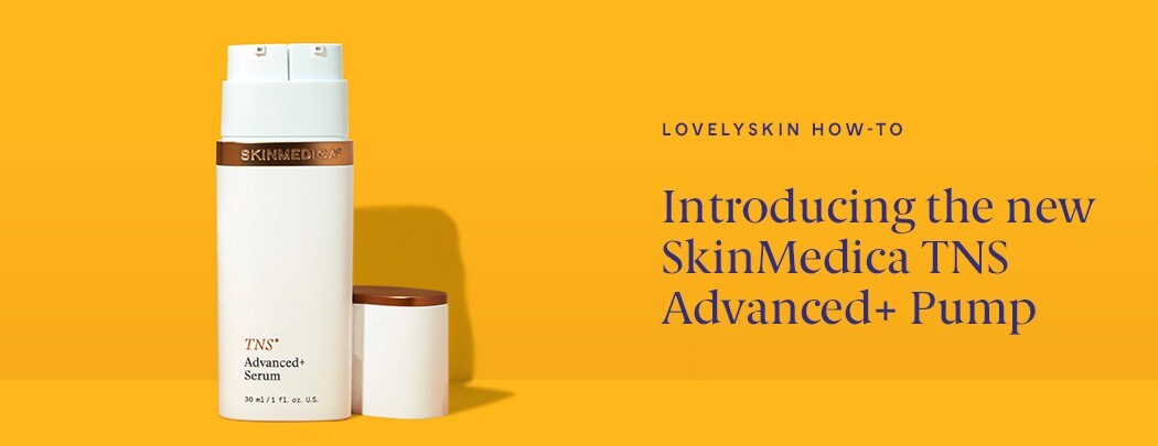 A white bottle with bronze details that reads "TNS Advanced+ Serum" stands on a yellow background.