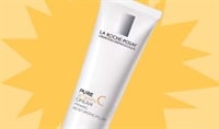 White La Roche-Posay Vitamin C cream tube against a yellow background