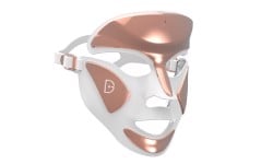 Tools & Accessories arranged on a green table. Shop LovelySkin for FOREO, Joylux and other top brand skin care tools and accessories.