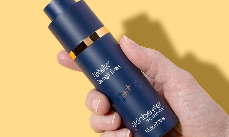 Hand holding product bottle