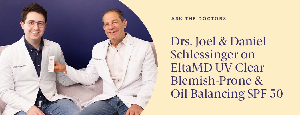 Drs. Joel and Daniel Schlessinger sit next to one another while smiling. Dr. Joel holds a box of EltaMD UV Clear Blemish-Prone & Oil Balancing SPF 50.